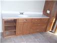 Hickory cabinets - Flat panel doors - Full overlay style - Cultured marble countertop with an integral sink