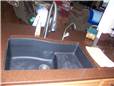 Quartz countertop with a composite undermount sink