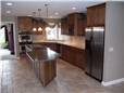 Maple cabinets - Flat panel doors, drawer fronts, and side panels - Full overlay style - Corian solid surface countertops