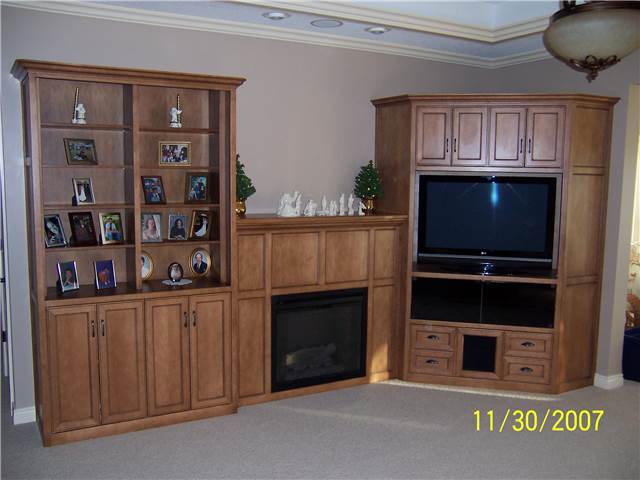 Entertainment center/Bookshelves/Fireplace enclosure/Storage - Maple stained & glazed