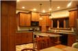 Quartersawn white oak cabinets - full overlay style with flat panel doors - laminate countertops