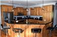 Rustic hickory with light stain - Granite countertops