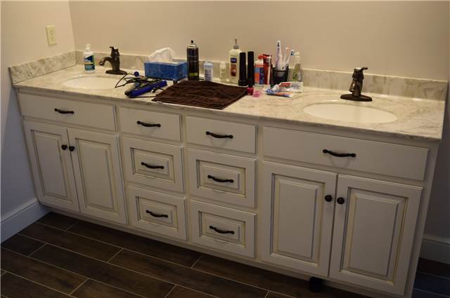 Painted and glazed cabinet - Cultured marble countertop with solid color sinks