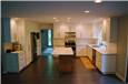 Painted perimeter cabinets - Stained maple island - Quartz countertops