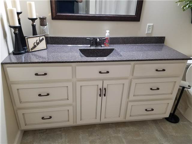 Painted and glazed cabinet - cultured granite countertop
