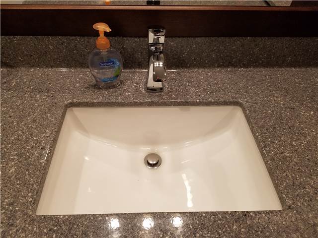 Cultured granite countertop with an undermount porcelain sink