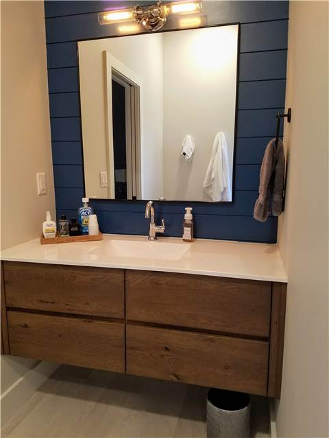 Rustic hickory floating vanity- stained - slab front - cultured marble countertop