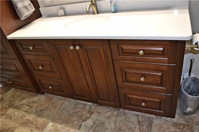 Stained hickory cabinet - Quartz countertop