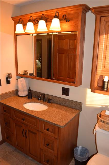 Stained hickory cabinets - Quartz countertop