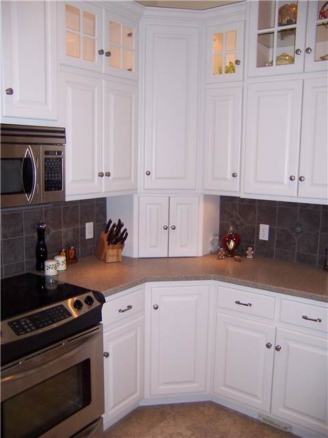 Corner cabinets - upper, lower, and appliance garage - doors closed