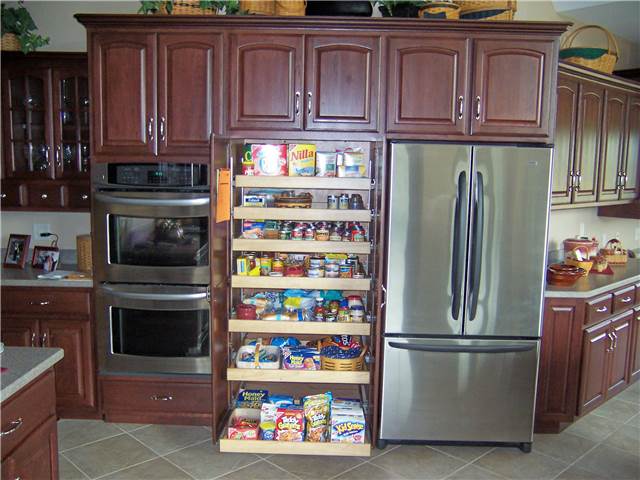 Pantry cabinet with pull-out shelves