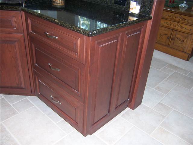 Base cabinet end with raised panels
